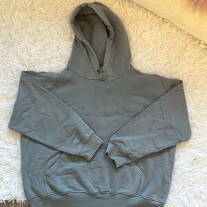This is an H&M blue is gray hoodie in women's size medium